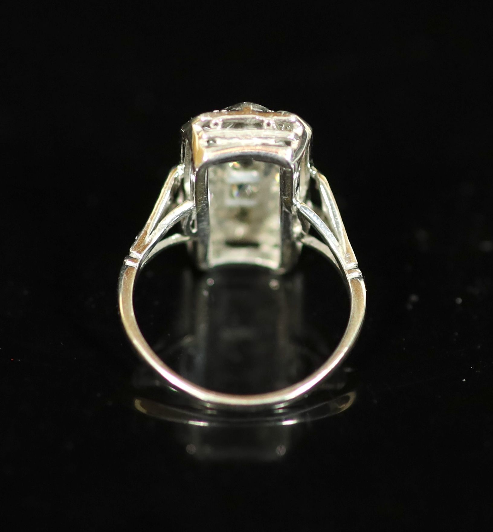 A 1930's/1940's white gold? and diamond cluster tablet ring